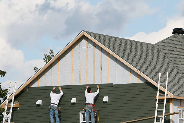 Professional Vinyl Siding technician working in Fairview, OR